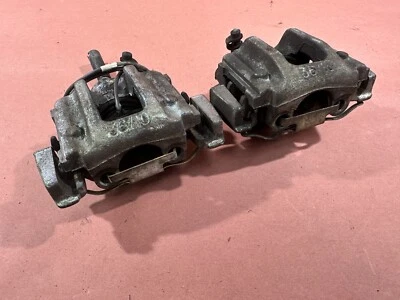 Pinza de freno delantera BMW E36 Z3 318I 318ti con par de pastillas portadoras OEM 45 k millas Foto 1 de 4