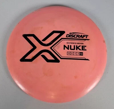 Used Discraft X Nuke 164-166g Disc Golf Distance Driver Pink 13/5/-1/3 ds - Image 1 of 4