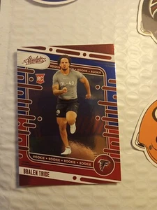 2024 Panini Absolute Holiday Red Blue Bralen Trice #163 Football Falcons RC - Bild 1 von 6