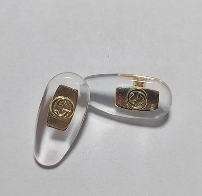 NUEVO Almohadillas nasales de silicona de repuesto plateadas Gucci para gafas de sol gafas atornilladas Foto 1 de 4