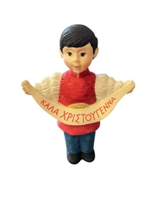 Figura Niño con túnica roja Griega Deseo compartiendo la alegría Sello Colecciones - Imagen 1 de 3
