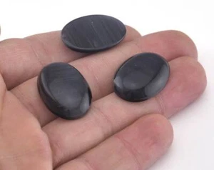 Schwarzes synthetisches Katzenaugenglas 25 x 18 mm Cabochon cab120-07 - Bild 1 von 2