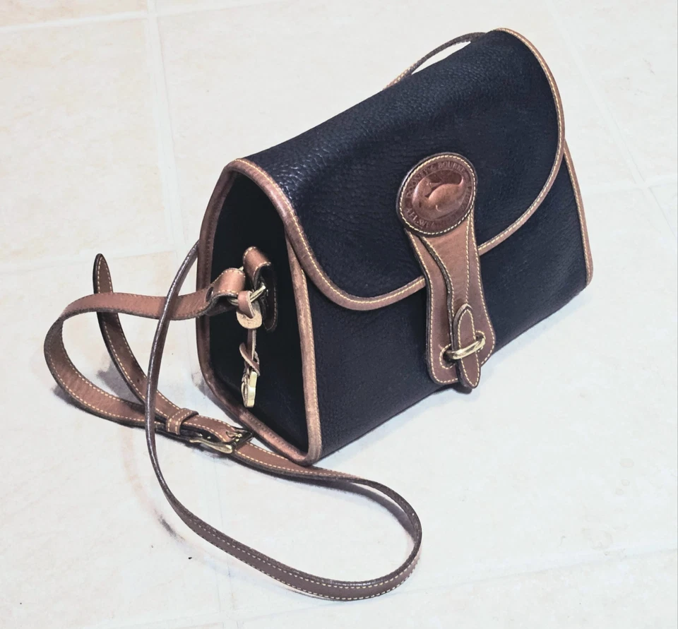 Vintage Dooney & Bourke Essex All Weather Leather Crossbody Dark Blue & Tan Med. - Image 1 of 4