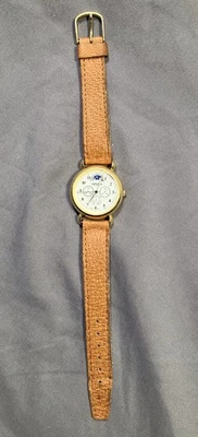 Reloj Vintage Nelsonic Watch-It Fase Lunar NCM W01 012 2115 Bisel Dorado con Correa Foto 1 de 4