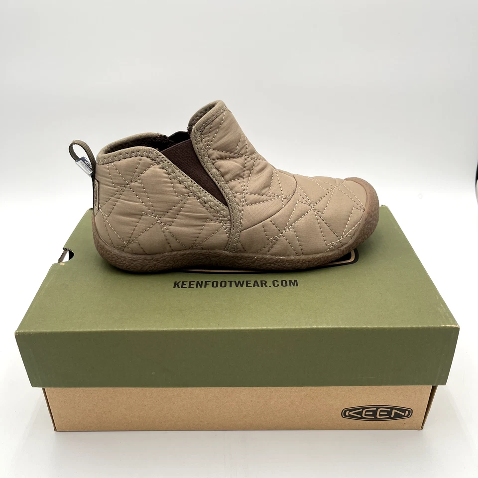 Bota de moda cómoda sin cordones al tobillo Keen Howser para mujer, negra/Timberwolf Foto 1 de 2