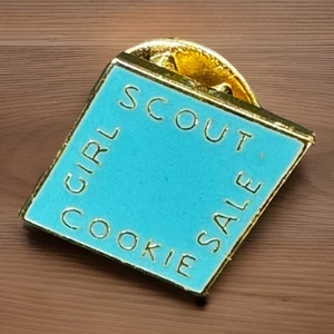 Prendedor de galletas GSA Scouts Girl Scouts America venta de galletas solapa faja prendedor azul - Imagen 1 de 6