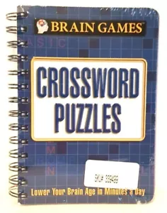 BRAIN GAMES: CROSSWORD PUZZLES BY PUBLICATIONS INTERNATIONAL LTD NEW - Foto 1 di 4
