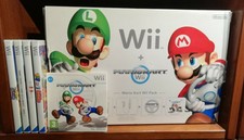 Nintendo Wii+wii wheel+2 wii remote plus+2 nunchuk+5 giochi+scatolo originale