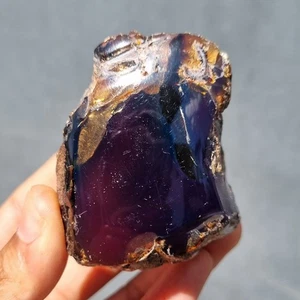 67 gr Ambra Sumatra originale grezza bluastra nera - Ambra Sumatra mezza lucida - Foto 1 di 6