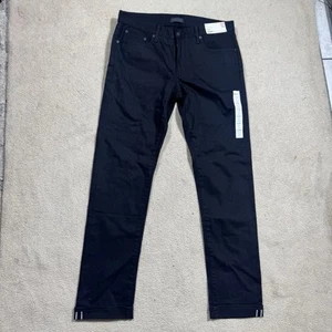 Pantalones de mezclilla Uniqlo para hombre 33 negros tiro medio ajustados rectos negros 33x31,5 NUEVO - Imagen 1 de 15