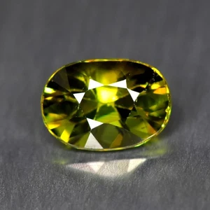 0.89Ct Pretty Unheated Russian Demantoid Garnet _ Oval - Picture 1 of 2