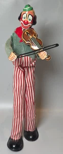 Vintage MCM Aufzieh Blechspielzeug Clown auf Stelzen spielt Violine, Japan T. P. S. LESEN - Bild 1 von 14