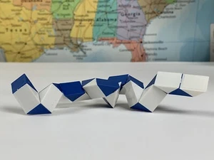๐ Gioco Puzzle Serpente Piccolo Giocattolo Twist Bianco e Blu - Foto 1 di 3