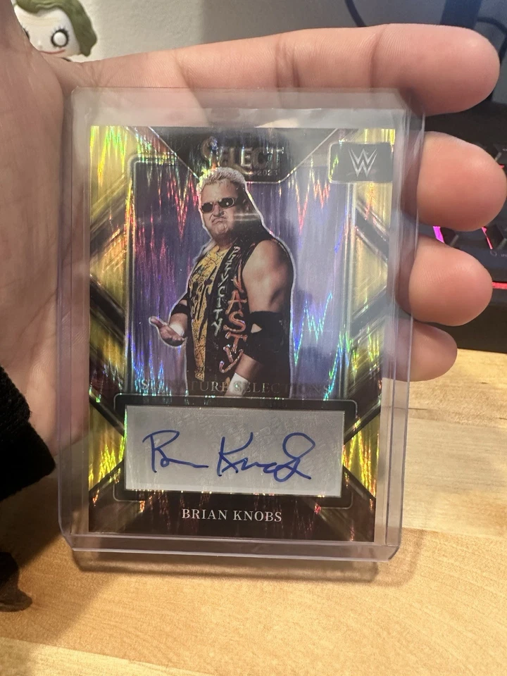 2023 Panini Select WWE Brian Knobbs Gold auto /5 - Image 1 of 3