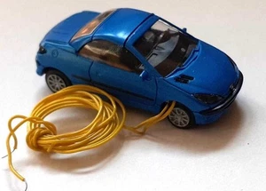 SAI 0900 - Peugeot 206 CC Bleue, Phares eclairés - HO (1:87) - Imagen 1 de 5