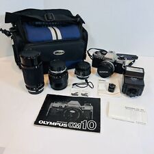Olympus Om-10 35mm Film Slr Camera w/ Zuiko 50mm and other Lenses, Case Manuals