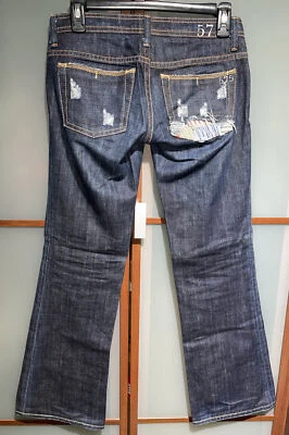 Pantalones de mezclilla 575 de Los Ángeles California para mujer desgastados parcheados bootcut azules 25 Foto 1 de 4