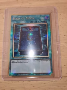 Book Of Moon MGED-EN039 Premium Gold Rare 1st Edition YuGiOh - Picture 1 of 3