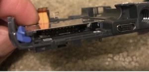 GENUINE SONY DSC-WX50  Battery COVER Holder -REPAIR PARTS - Picture 1 of 2