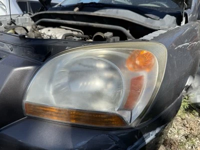 Conjunto de faros delanteros LH para conductor Kia Sportage LX 2007 2,7 L V6 4X4 FABRICANTE DE EQUIPOS ORIGINALES Foto 1 de 4