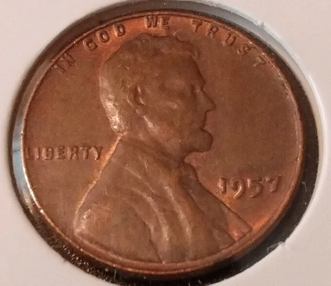 Rare 1957 Lincoln Wheat Penny. No Mint Mark. Very nice toning, error on "L" Cover