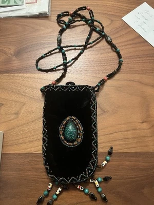 Monedero artesanal con cuentas Foto 1 de 4