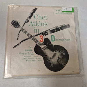 CHET ATKINS- CHET ATKINS IN 3 DIMENSIONS 7" 45 RPM RECORD LIKE NEW OOP - Picture 1 of 2