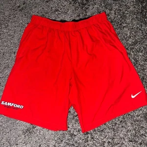 Nike Flex Woven Shorts 2.0 mit Taschen Samford Physiotherapie rot Fitnessstudio Large - Bild 1 von 9