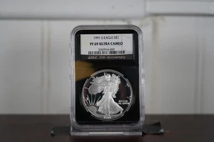 1991 American Silver Eagle Dollar PF69 Ultra Cameo NGC 25th Anniversary Label - Picture 1 of 2