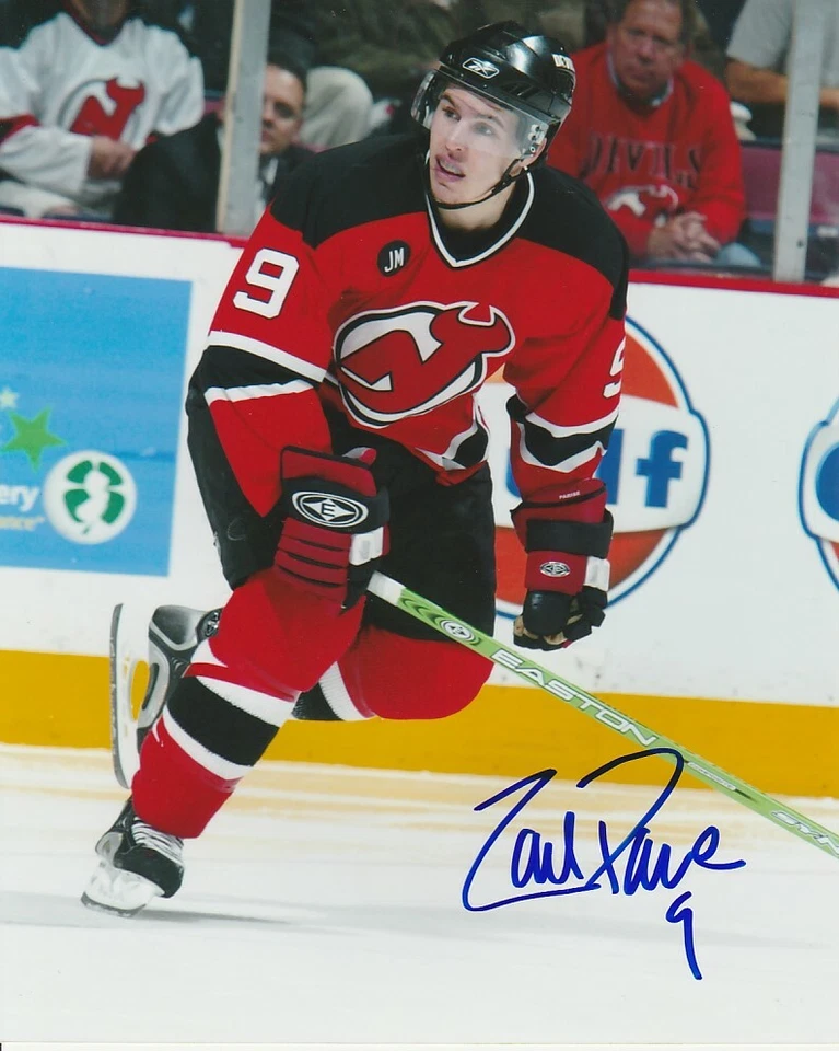 ZACH PARISE SIGNED NEW JERSEY DEVILS 8x10 PHOTO #1 Autograph - Image 1 of 1