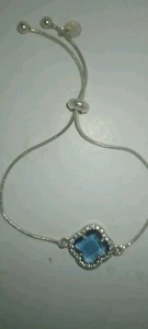 Clover-Shaped Swiss Silver Blue Topaz Bolo Bracelet Je 1-12 - Picture 1 of 4