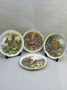 Platos de coleccionista de animales salvajes de porcelana de hueso de 4 Nicholas John/Dorothy Wallace - Imagen 1 de 8