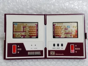 Nintendo Game Watch Multiscreen Mario Bros. POKKA MW-56 Pokka 1983 Retro Vintage - Picture 1 of 10