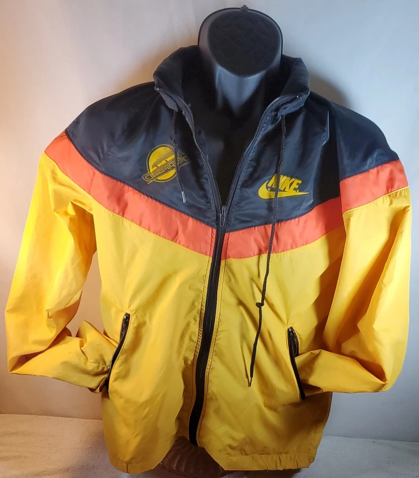 Chaqueta cortavientos vintage Victory Vancouver Canucks Nike con capucha pequeña Foto 1 de 4
