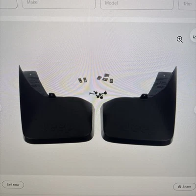 Genuine Mopar Guard Kit. GM 82209621. 2010 Jeep Commander. Rear.          JP - Image 1 of 4