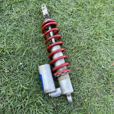 Suspensión amortiguador trasero Suzuki RMZ250 2004-2006 OEM KK450-14008-5CD Foto 1 de 4