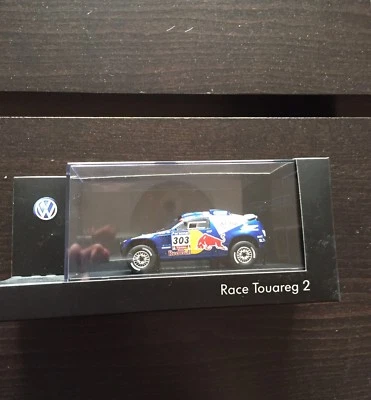 VW RACE TOUAREG 2 FACELIFT 2010 #303 WINNER RED BULL 1:43 SPARK (DEALER MODEL) - Image 1 of 2