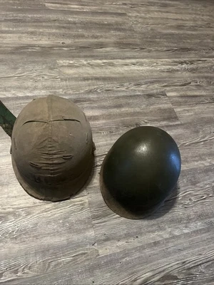 Casco de guerra vintage militar de Estados Unidos con inserción y cubierta de camuflaje Foto 1 de 4