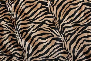 TELA DE COSTURA POLBOA DE PIEL SINTÉTICA CAFÉ Y CEBRA NEGRA CON IMPRESIÓN ANIMAL POLIETILENO POR YARDA - Imagen 1 de 3
