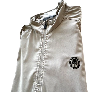 Zero Restriction Tour Series Jacket Windbreaker Mens M Golf 1/4 Zip Tan SS - Picture 1 of 13