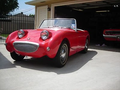 NUEVO 1958-63 MG MIDGET/AUSTIN HEALEY SPRITE KIT DE AMORTIGUADOR TUBO MONROE DELANTERO+TRASERO Foto 1 de 4