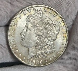 Dólar de plata Morgan 1886 BU++ tonificado - Imagen 1 de 2
