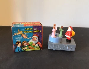 VTG SANTA WITH DANCING ANGELS FRICTION DRIVE TOY HONG KONG BOX *NOS* EXCELLENT - Picture 1 of 11