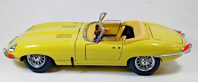 Burago 1961 Jaguar Modelo E, Coche Diecast Amarillo, Hecho en Italia, escala 1/18. Piezas Foto 1 de 4