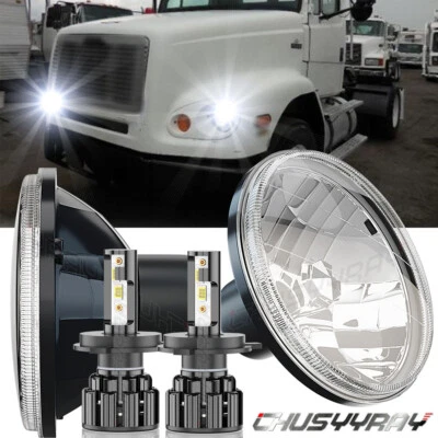 Par de faros proyectores redondos de 7 pulgadas H4 6000K aptos para camión Freightliner FL112 Foto 1 de 4