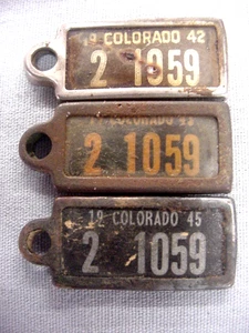 1942 1943 1945 Colorado DAV Keychain Mini License Plate Tags Pueblo County #1059 - Picture 1 of 5