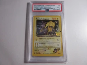 Tarjeta Pokémon PSA 9 Rocket's Zapdos Holo Colección Clásica Celebraciones - Imagen 1 de 2