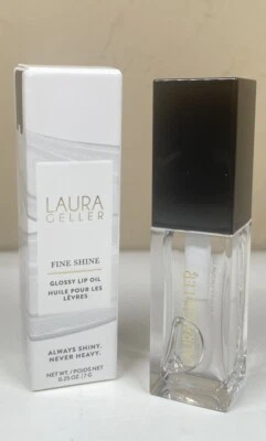 Laura Geller Fine Shine Glossy Lip Oil- Glass Half Full- Clear 0.25 oz - Image 1 of 2
