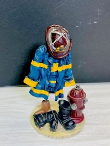 FIREMAN Toy Figurine With Coat Boots Small Resin 4.75 Inch High - Picture 1 of 2