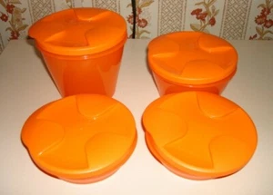 Juego de tazones de cuatro piezas Tupperware naranja en color como nuevo en plástico - Imagen 1 de 1
